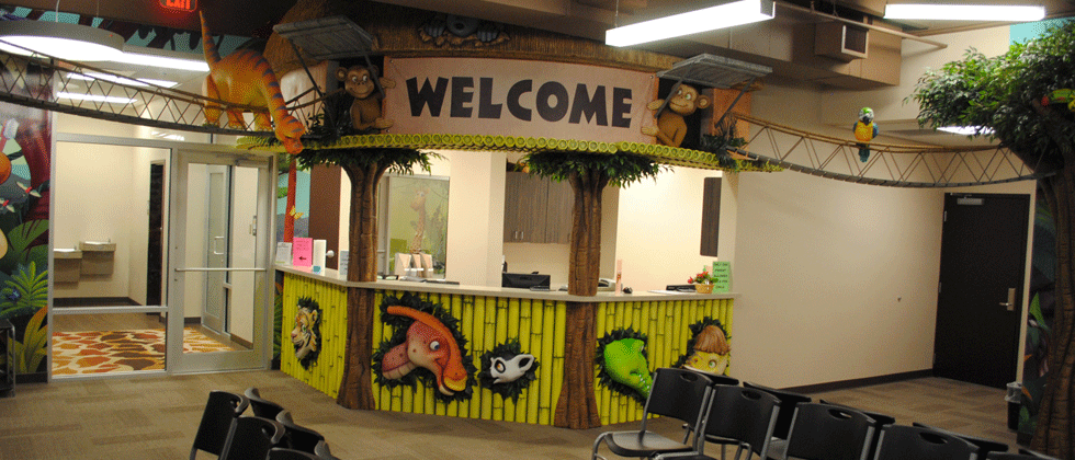 Jungle-themed reception desk with