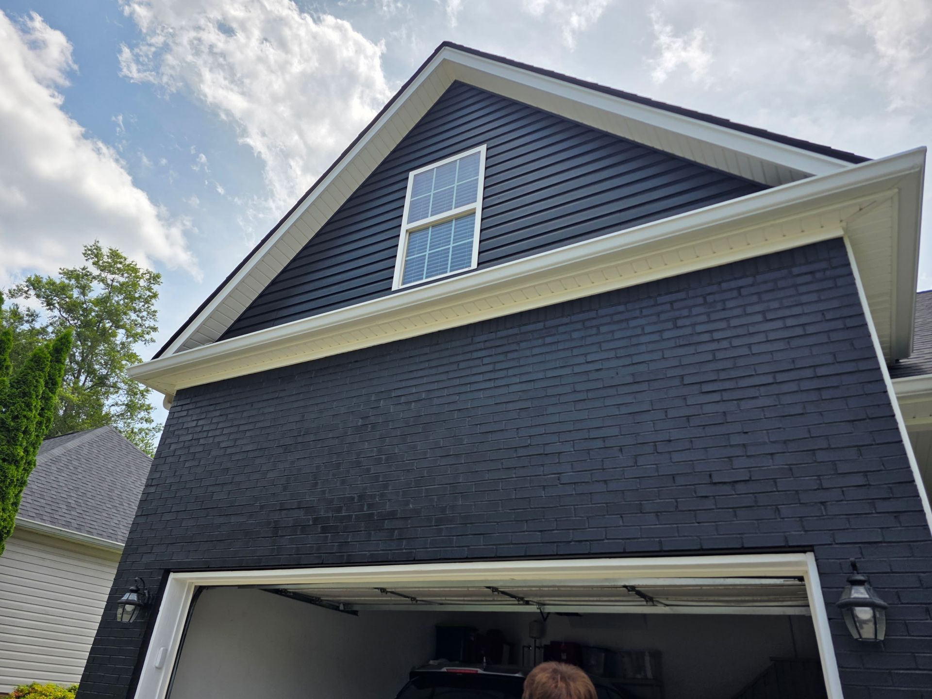 Brick house with open garage