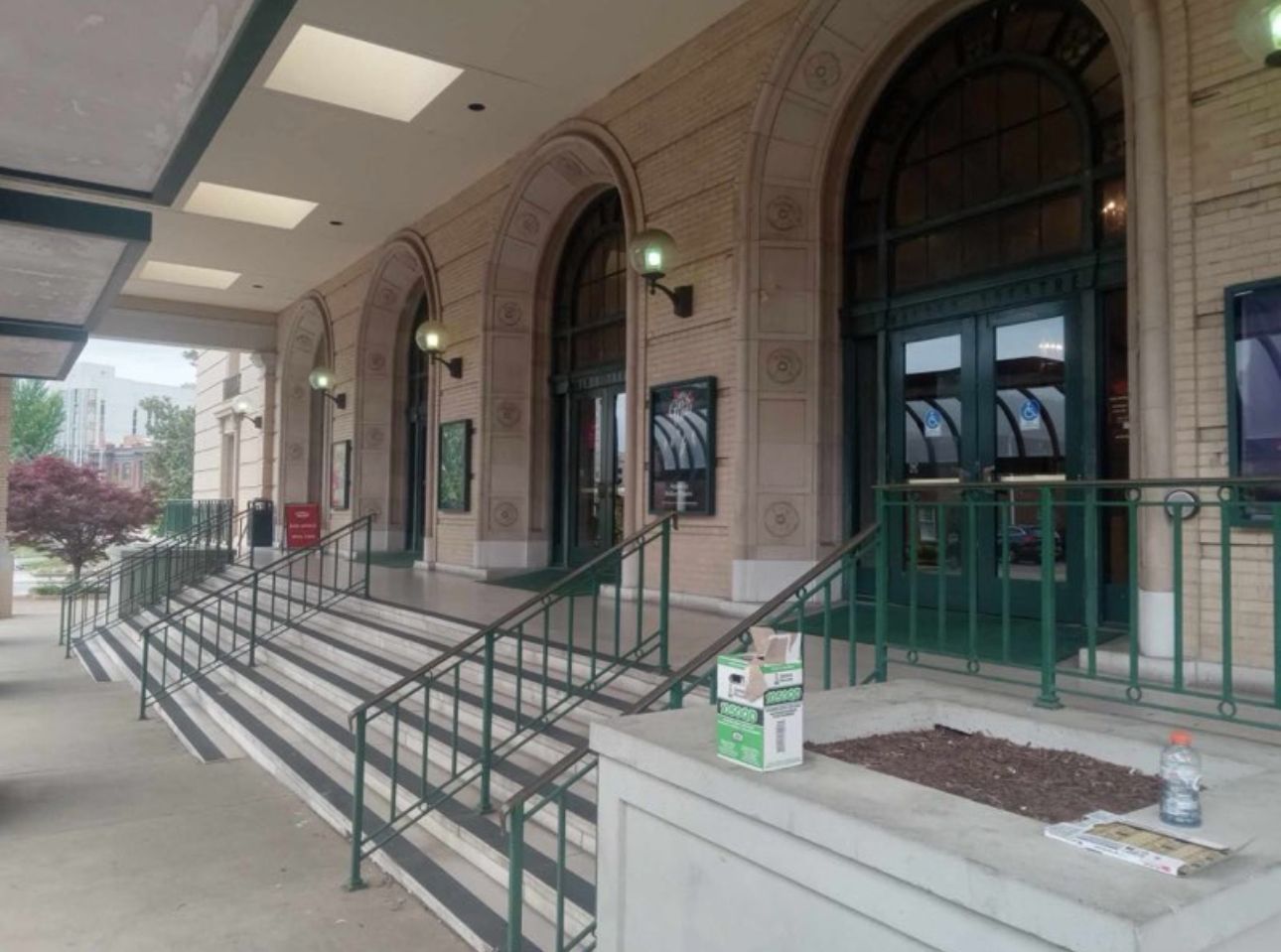 A front of a building with stairs