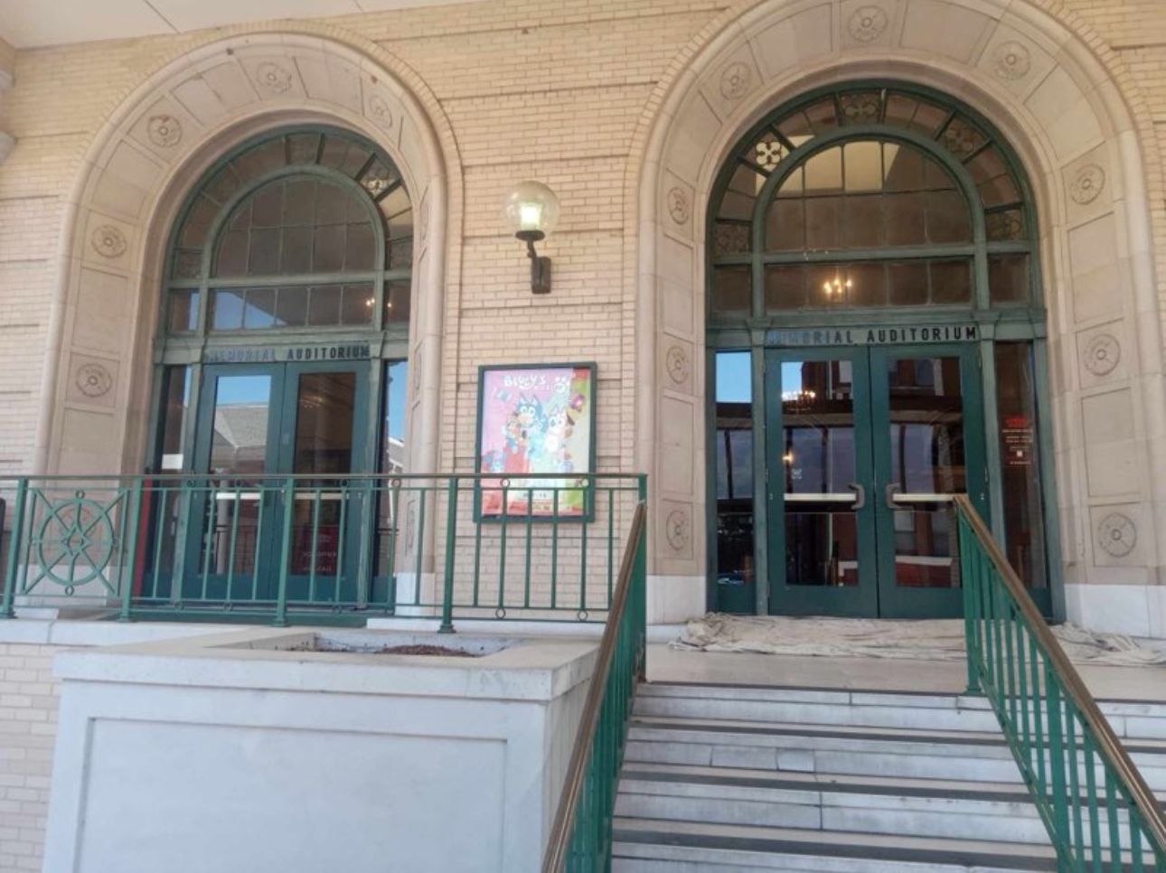 A building with arched windows and stairs