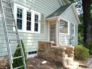 Siding painting after