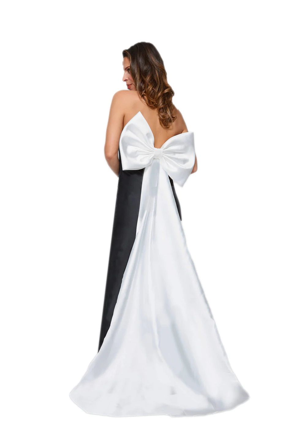 A woman is wearing a black and white dress with a large white bow on the back.