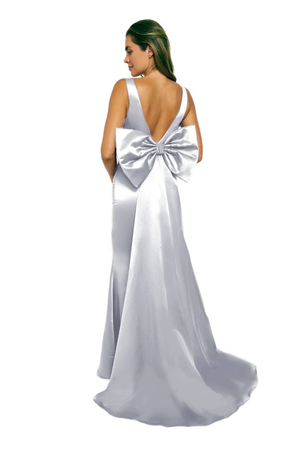A woman in a white dress with a bow on the back.