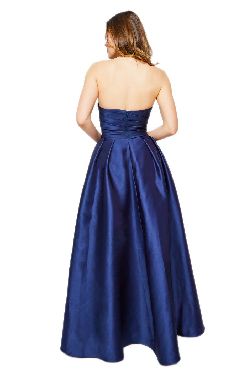 A woman is shown from the back, wearing a blue strapless dress.