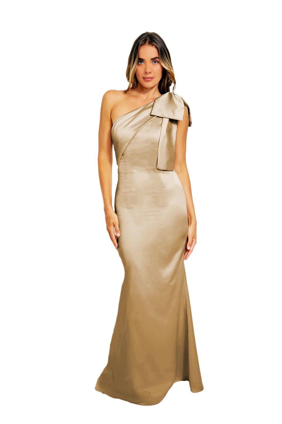 A woman is wearing a long gold dress with a bow on the shoulder.