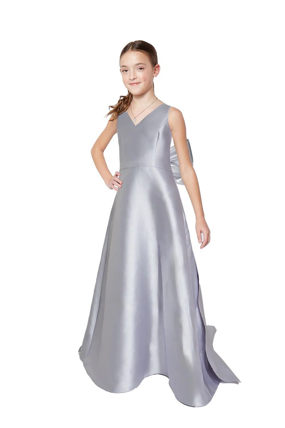 A little girl is wearing a long gray satin dress.