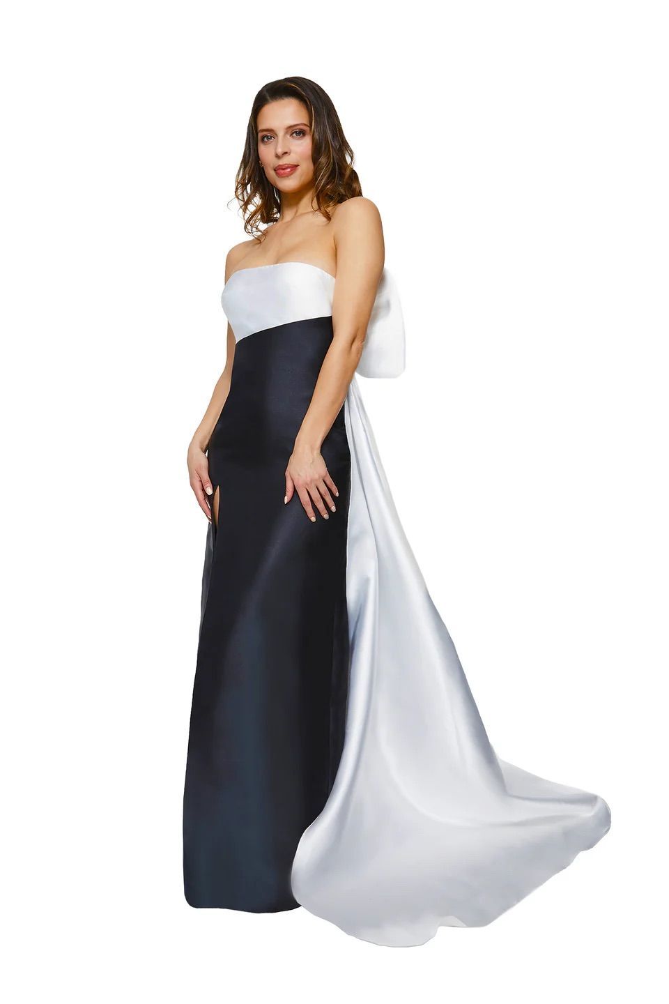 A woman is wearing a black and white strapless dress.