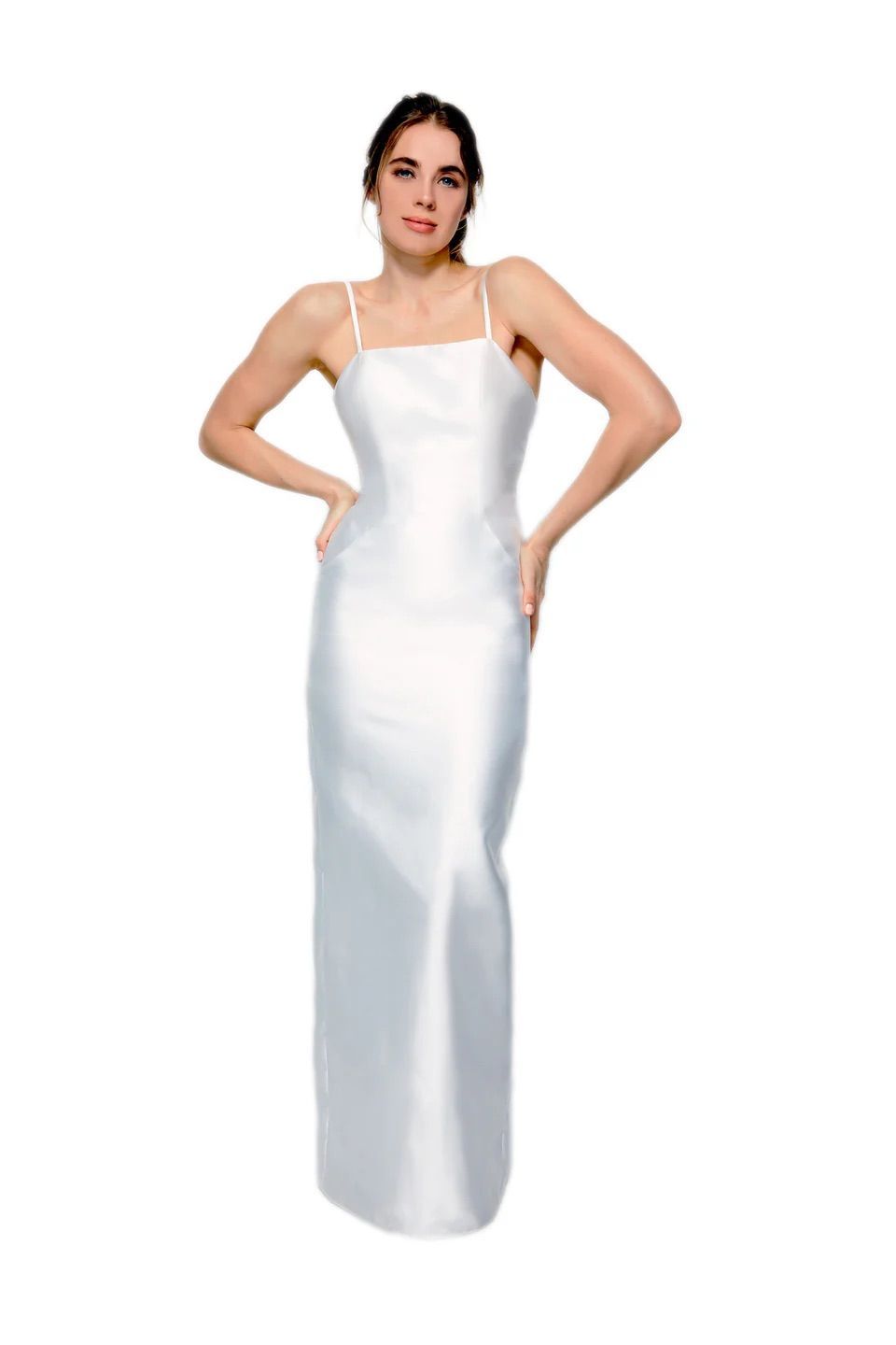 A woman in a white dress is standing with her hands on her hips.