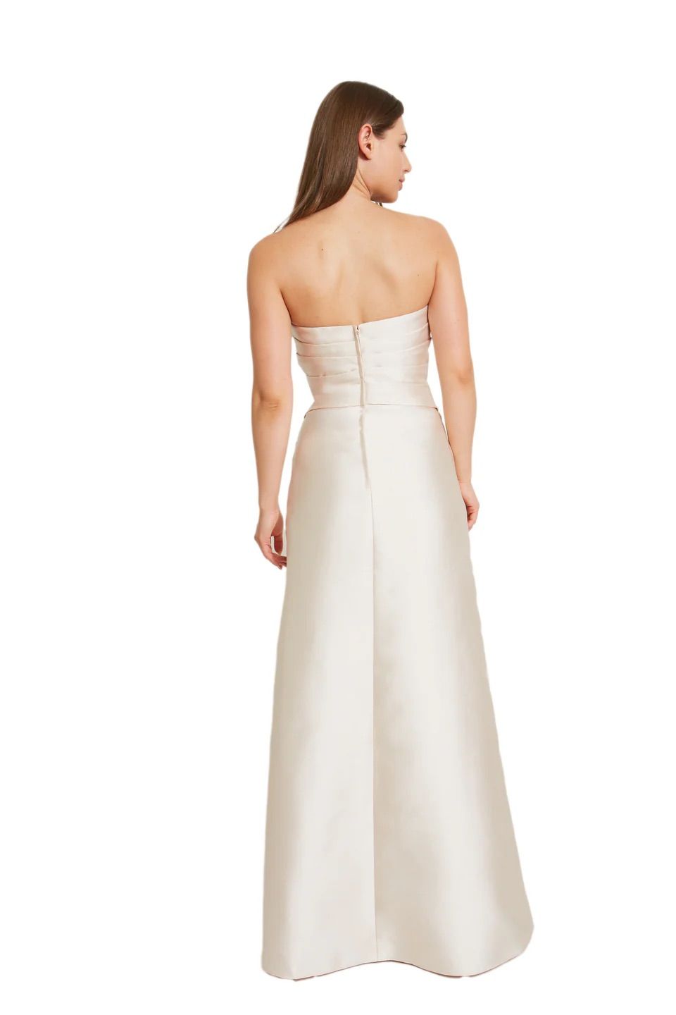 The back of a woman wearing a white strapless dress.