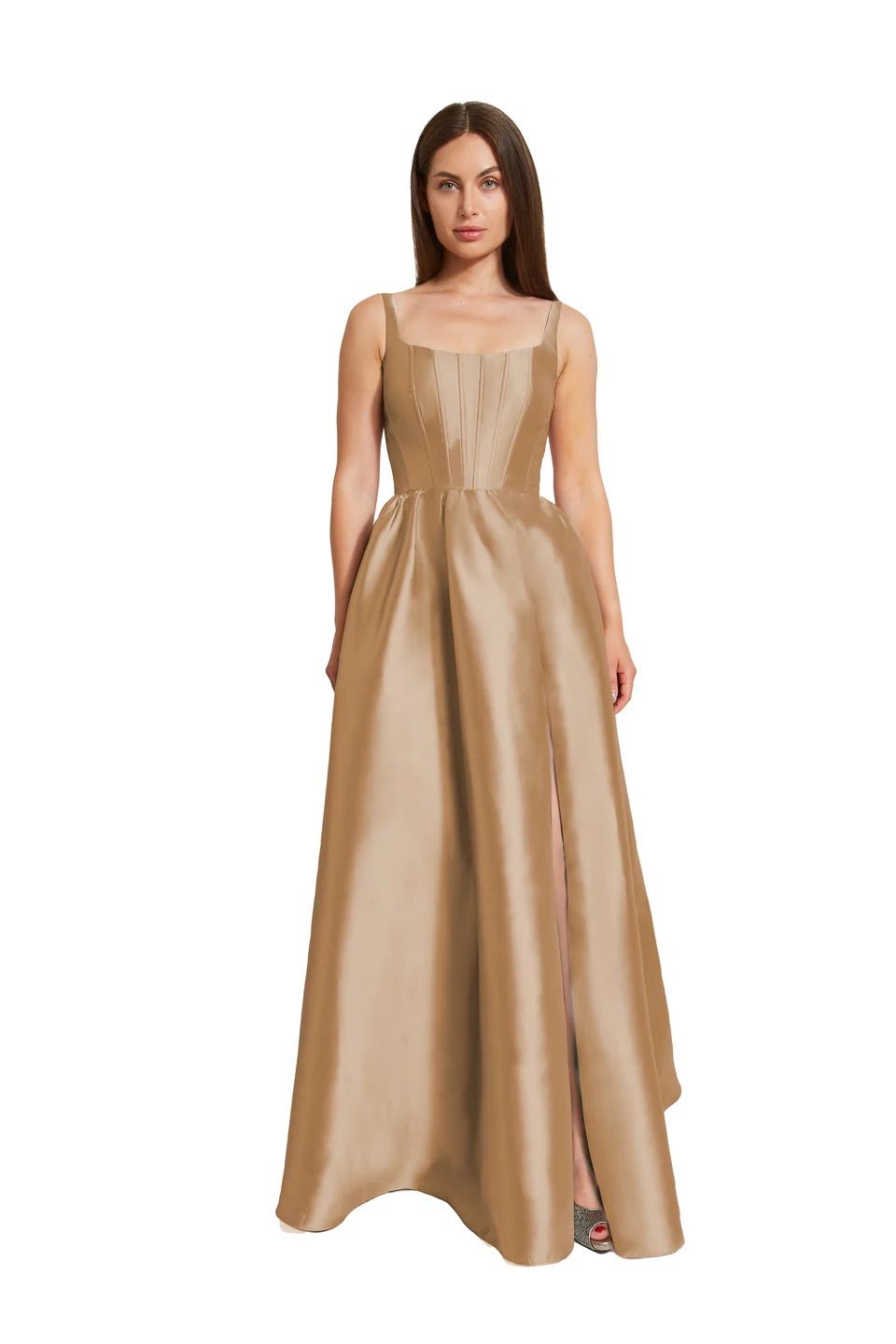 A woman is wearing a long brown dress.
