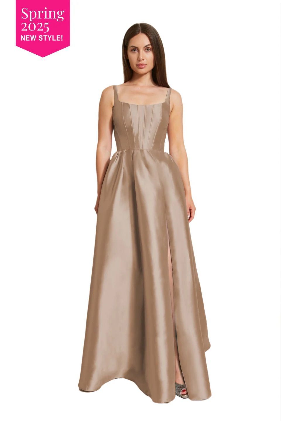 A woman is wearing a long satin dress with a high slit.
