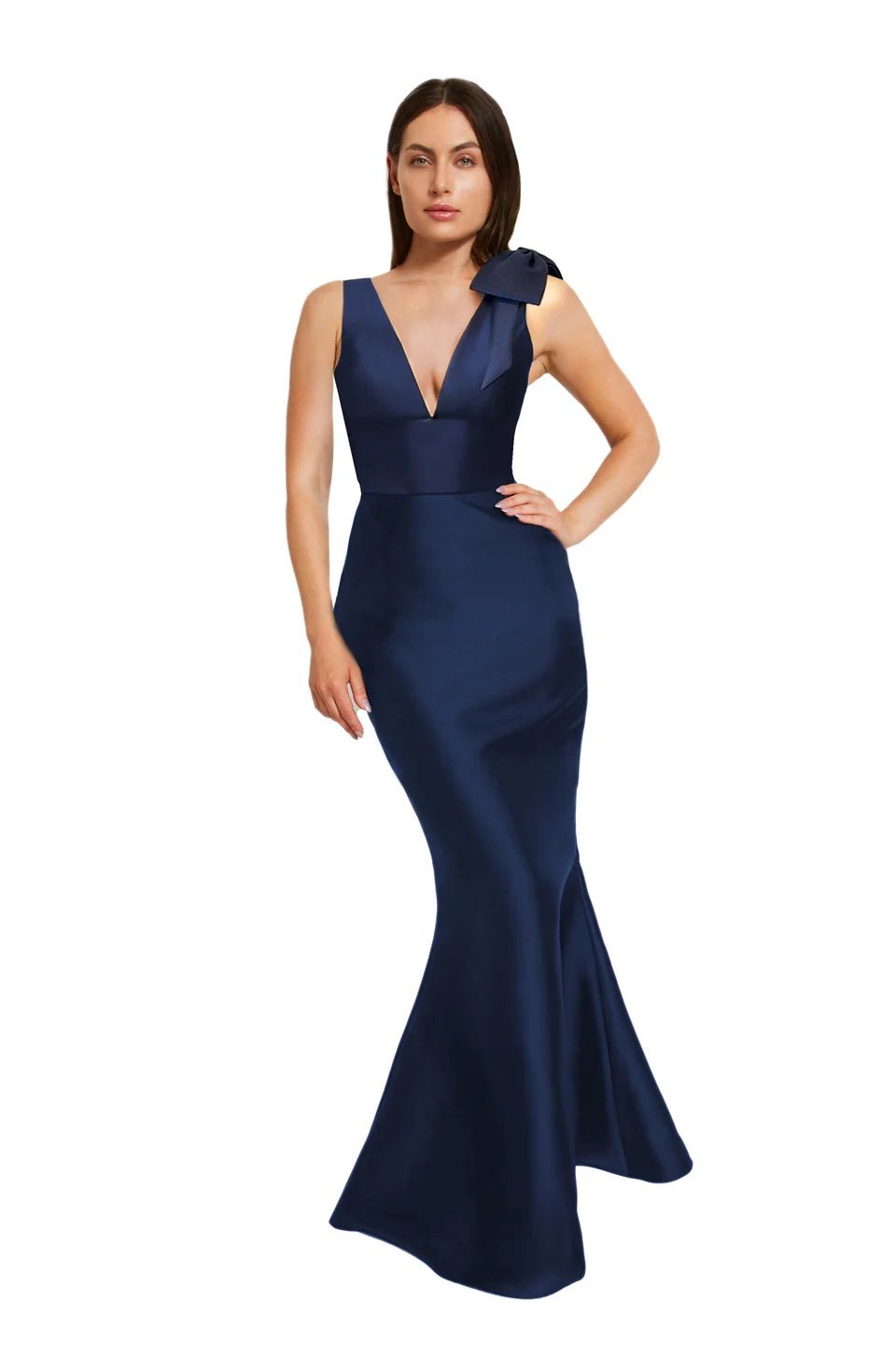 A woman is wearing a long blue dress with a plunging neckline.
