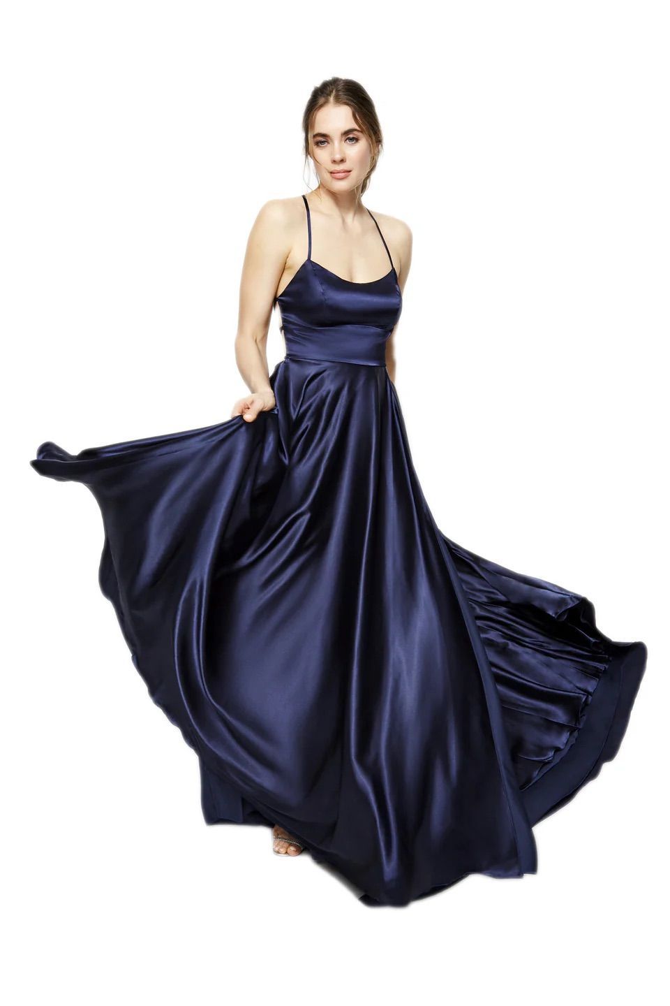 A woman is wearing a long blue satin dress.