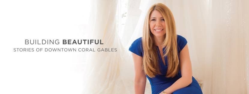 Woman with long blonde hair smiling in a blue dress, with white background and text: building beautiful.