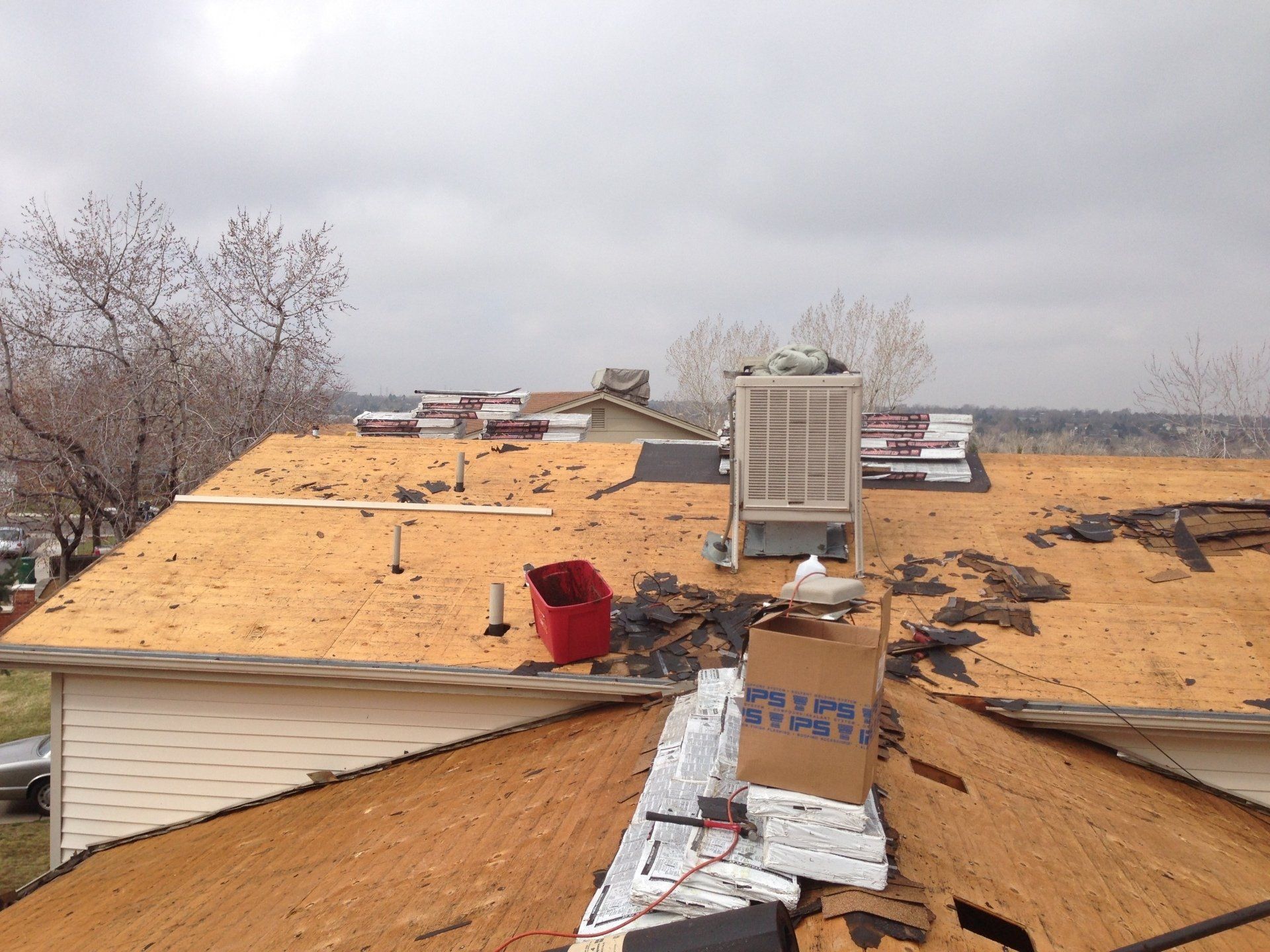 The roof of a house is being repaired