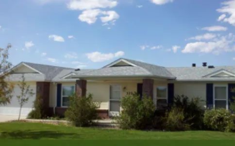 A house with a roof that is being repaired