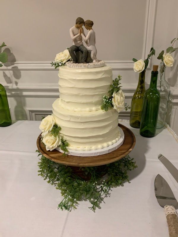 Simple 2 tier wedding with figurine on top