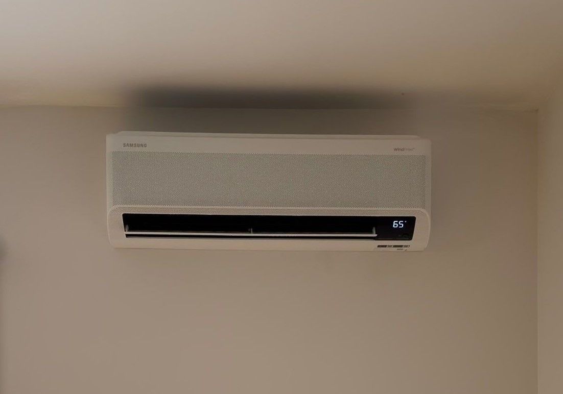 A white mini split air conditioner.