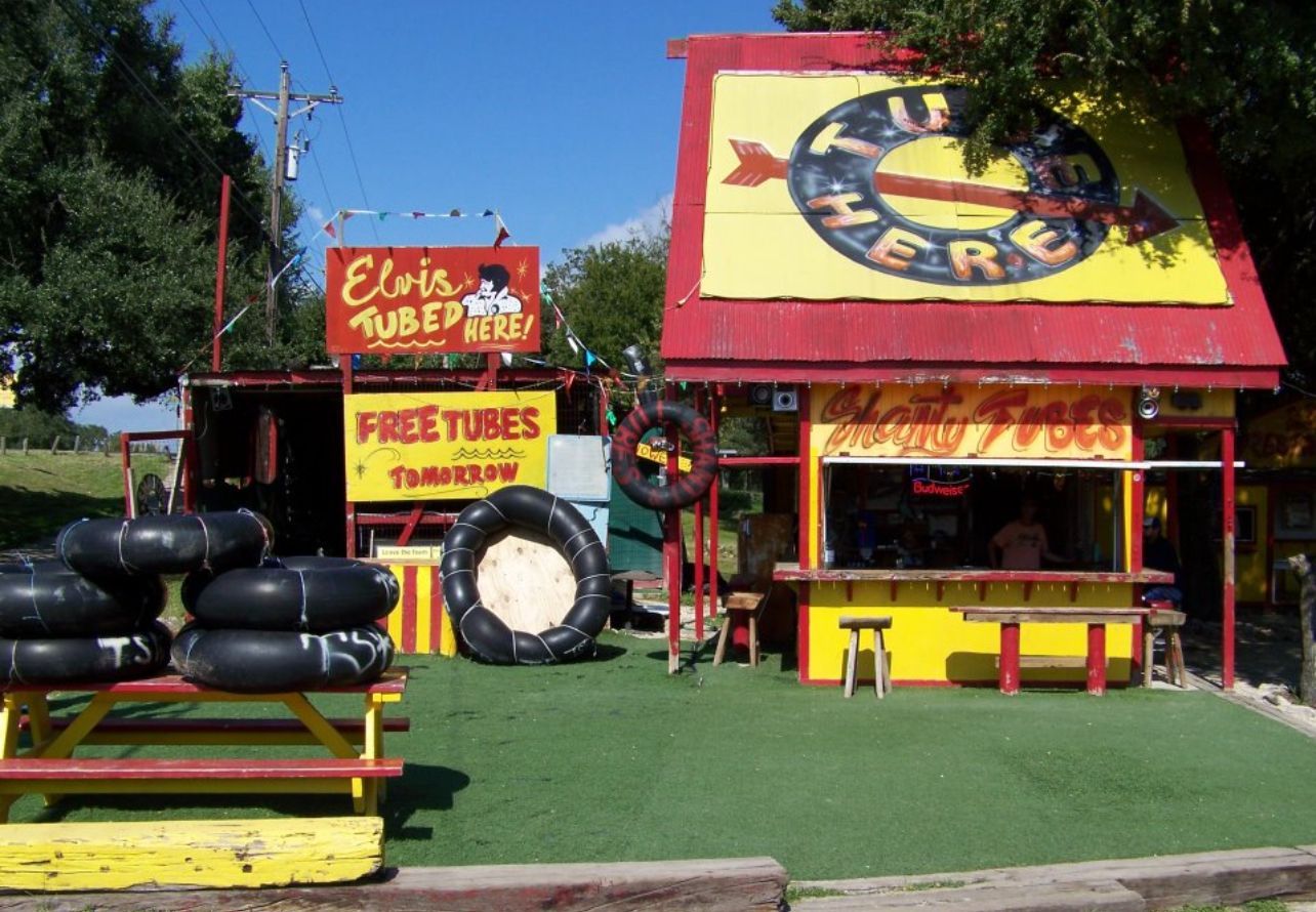 A store front with a sign that says free tires
