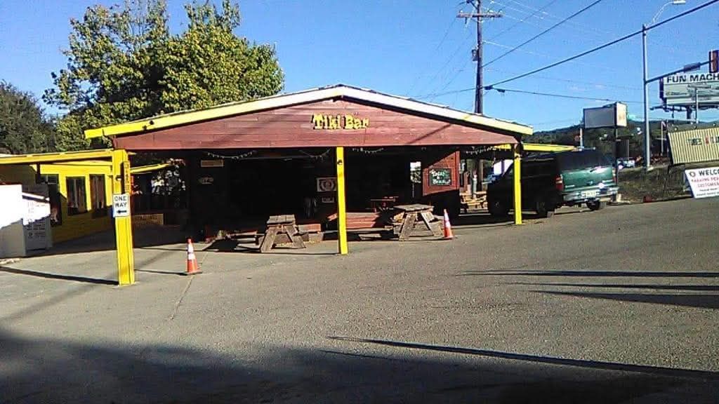 A covered area with a sign that says ' y & r ' on it