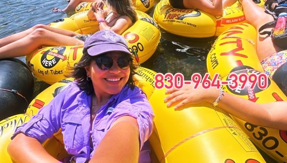 A group of people are floating on tubes in the water.