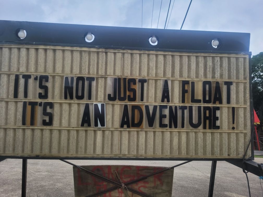 A sign that says it 's not just a float it 's an adventure
