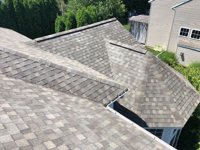 A roof of a house with a lot of shingles on it.