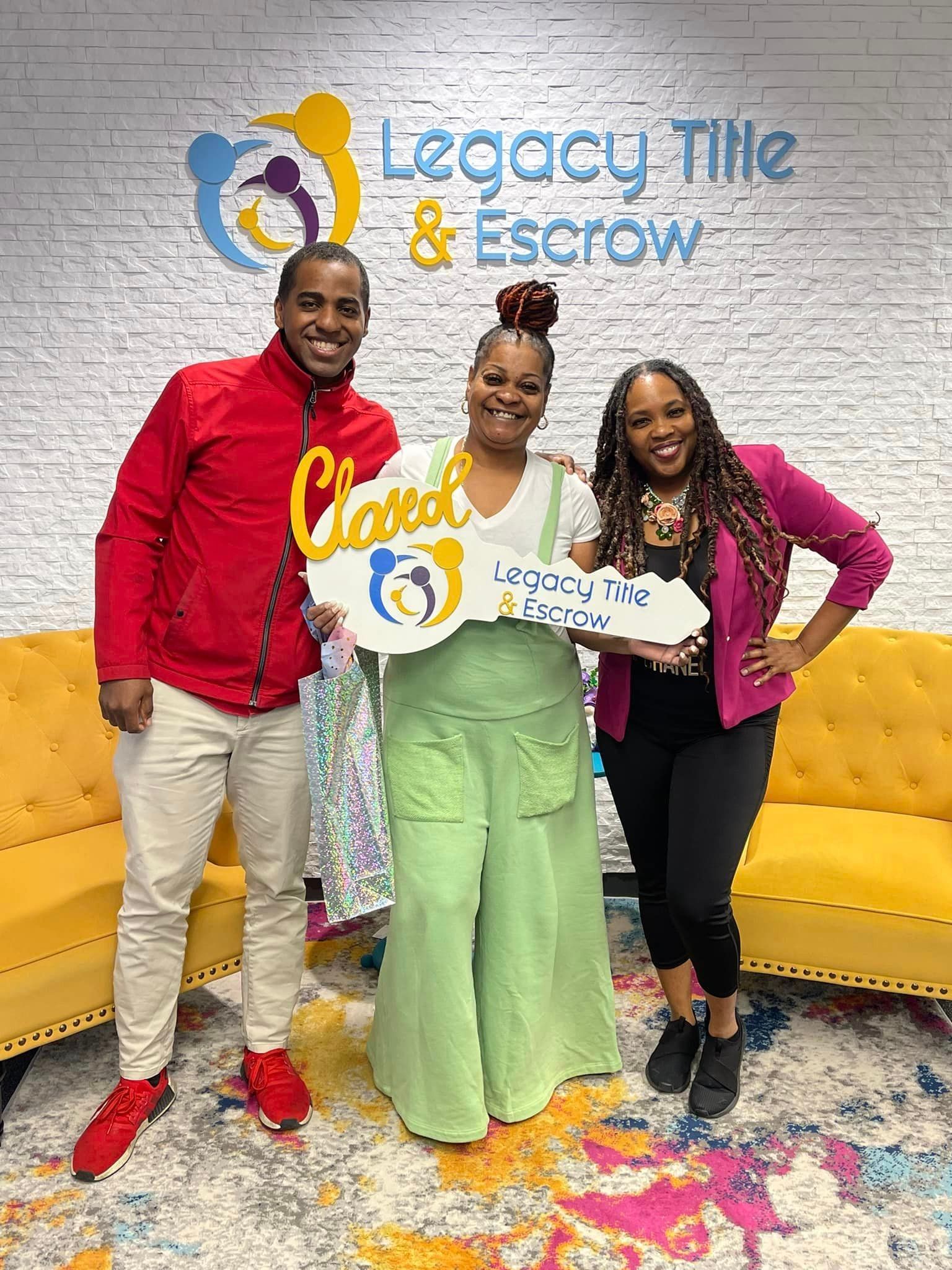 A group of people are standing next to each other in a room holding keys.