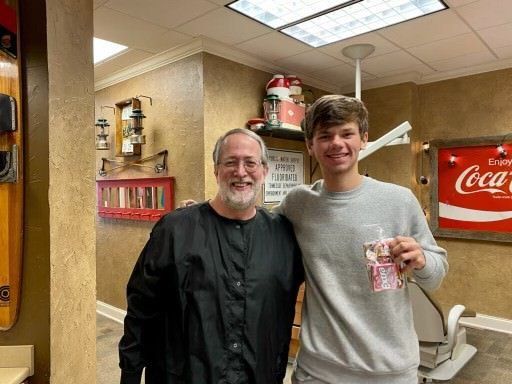 Dr. Coleman and patient after braces