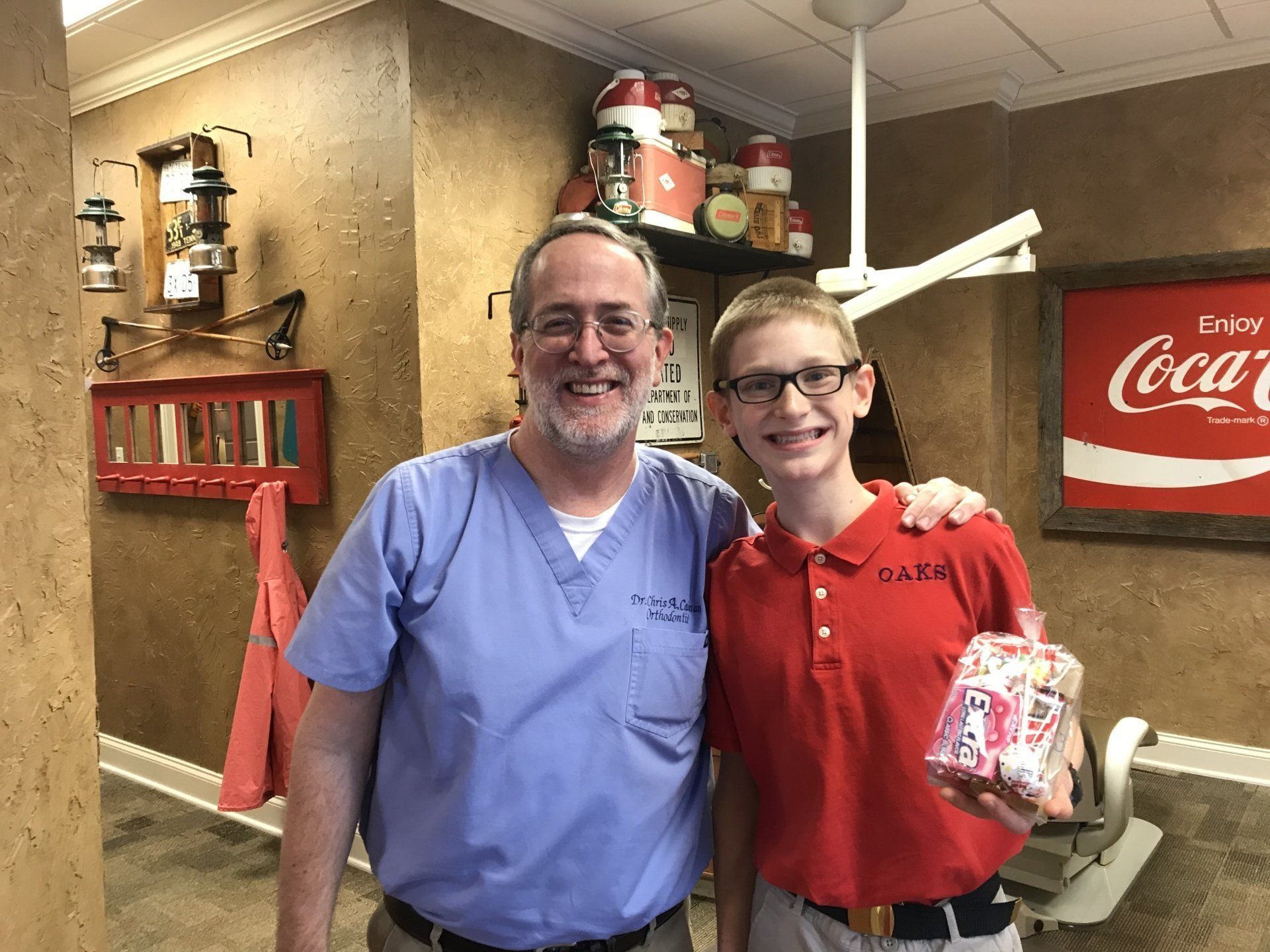 Dr. Coleman and patient after braces