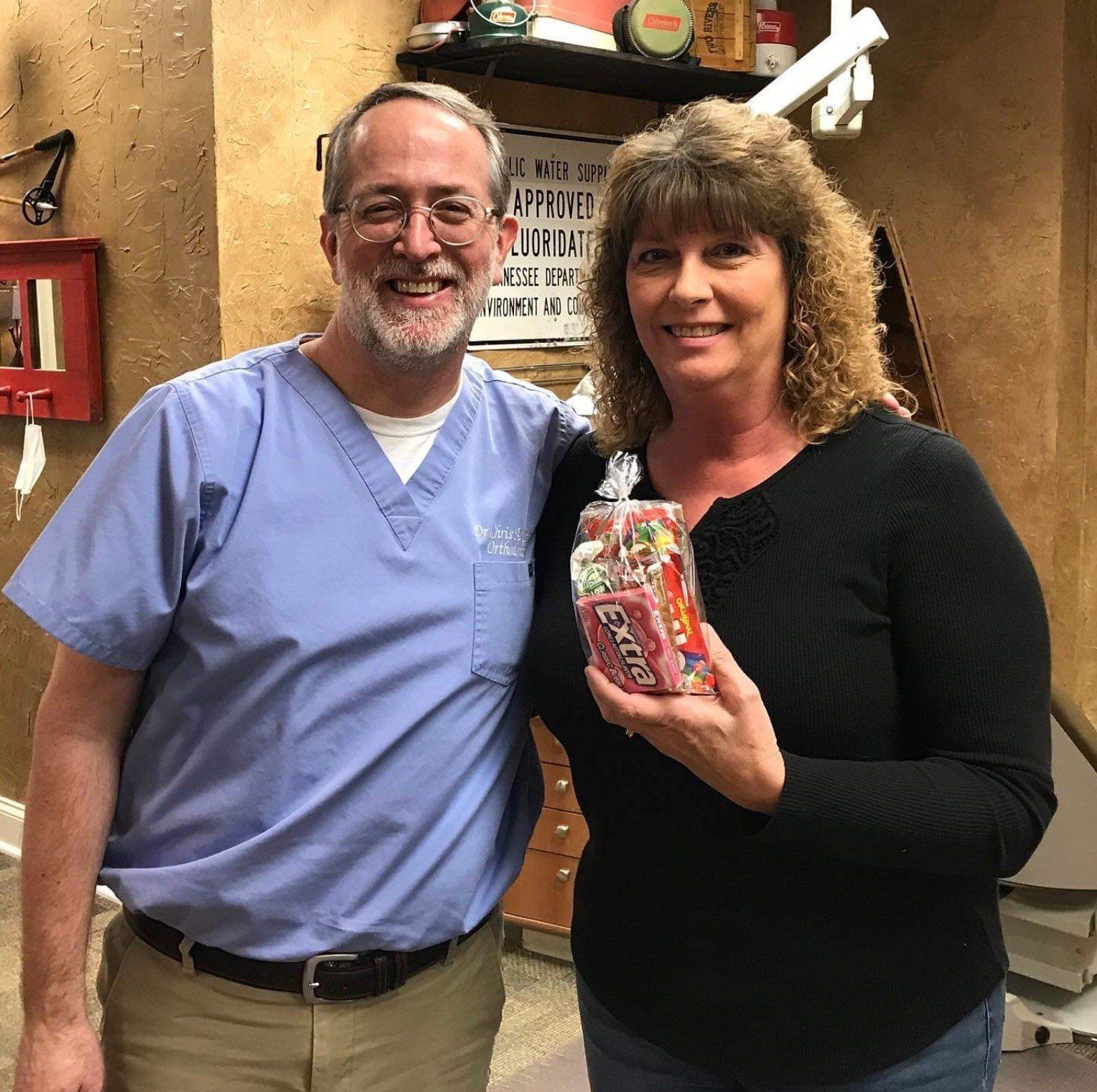 Dr. Coleman and patient after braces