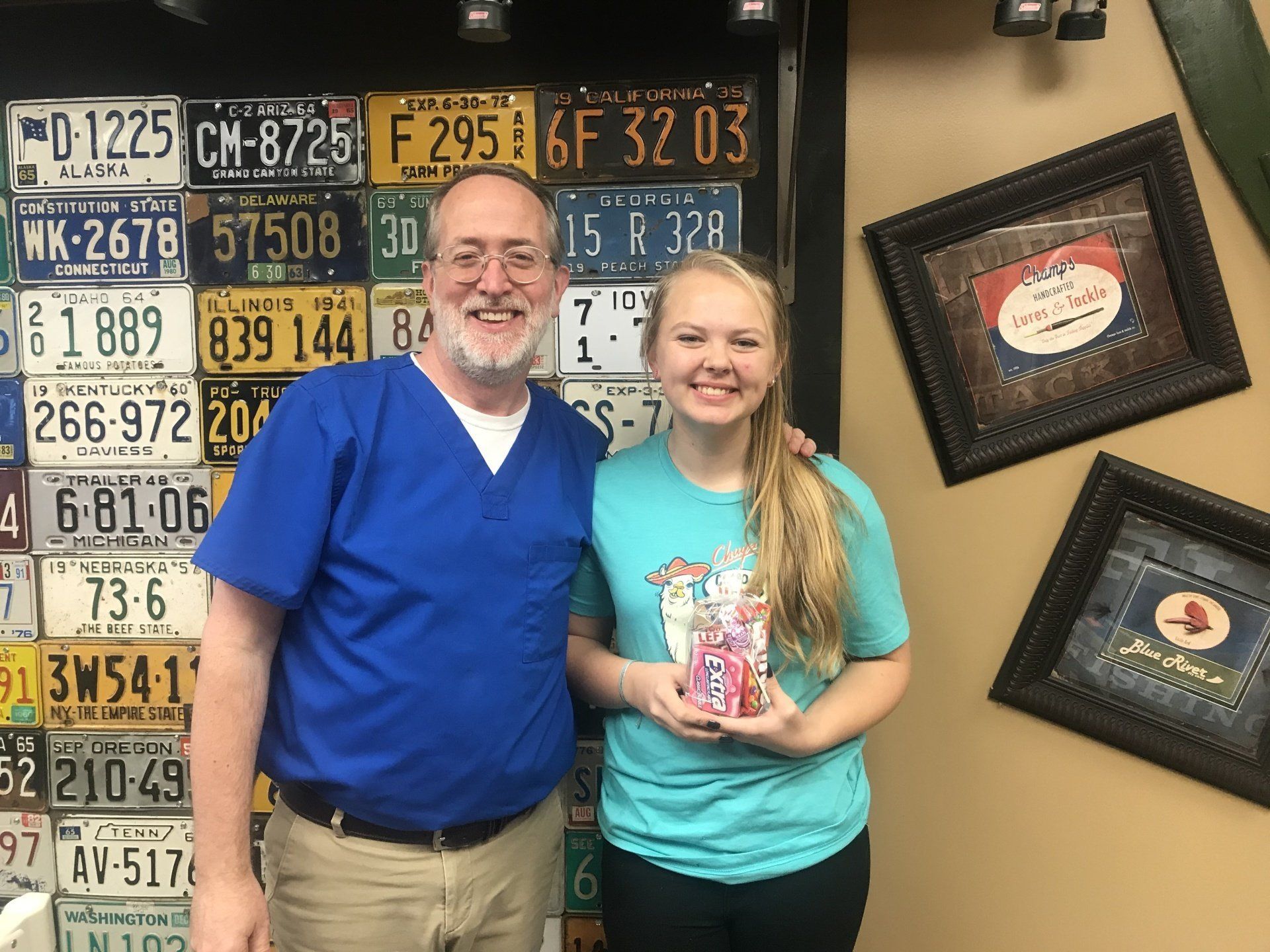 Dr. Coleman and patient after braces