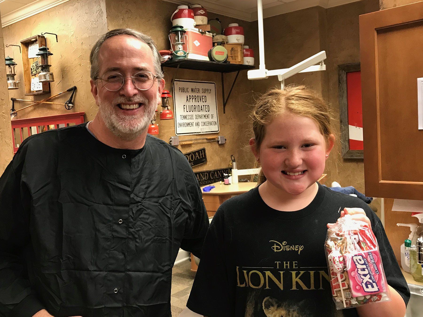 Dr. Coleman and patient after braces