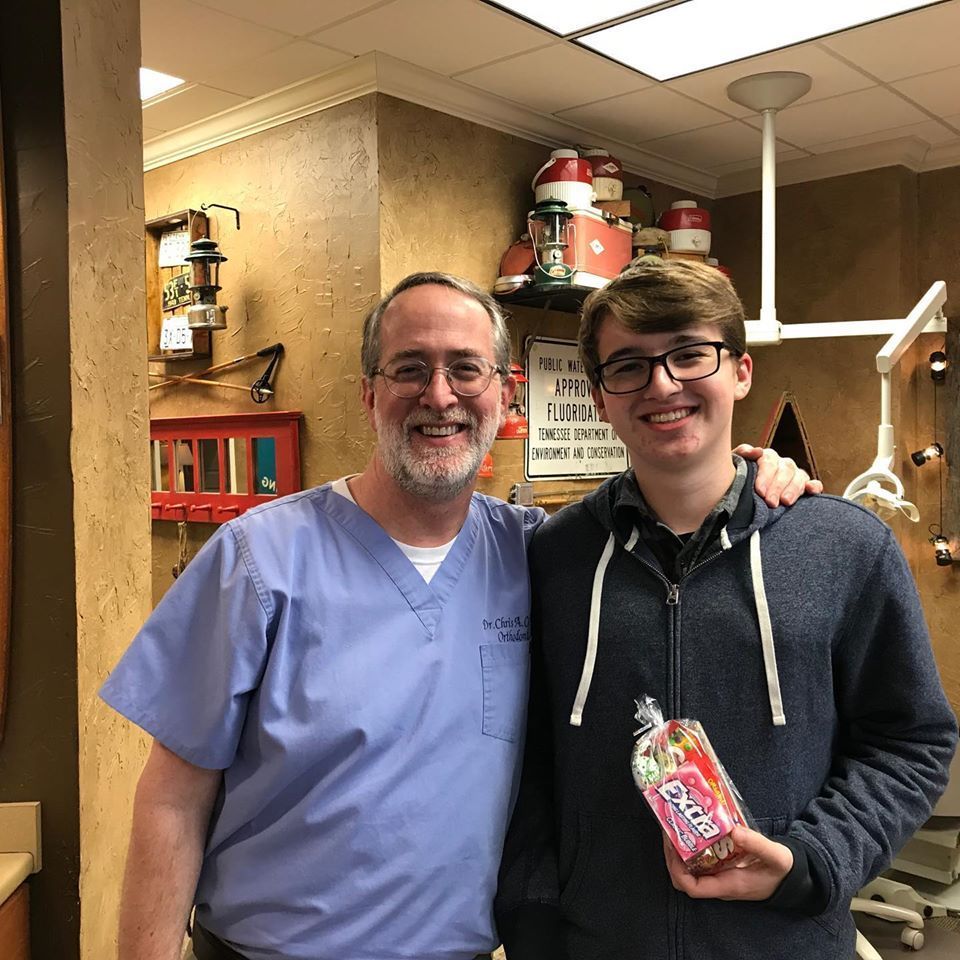 Dr. Coleman and patient after braces