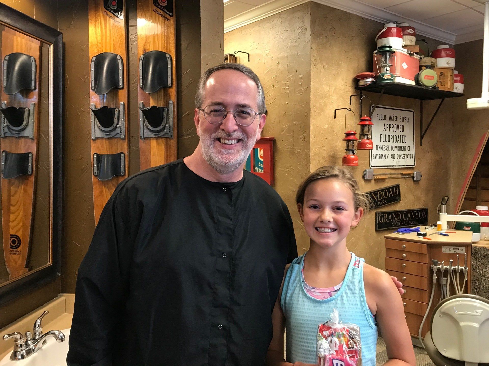 Dr. Coleman and patient after braces