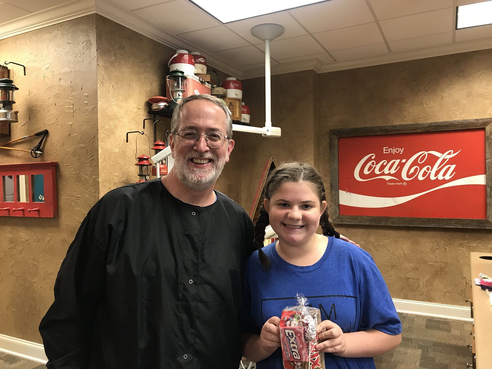 Dr. Coleman and patient after braces