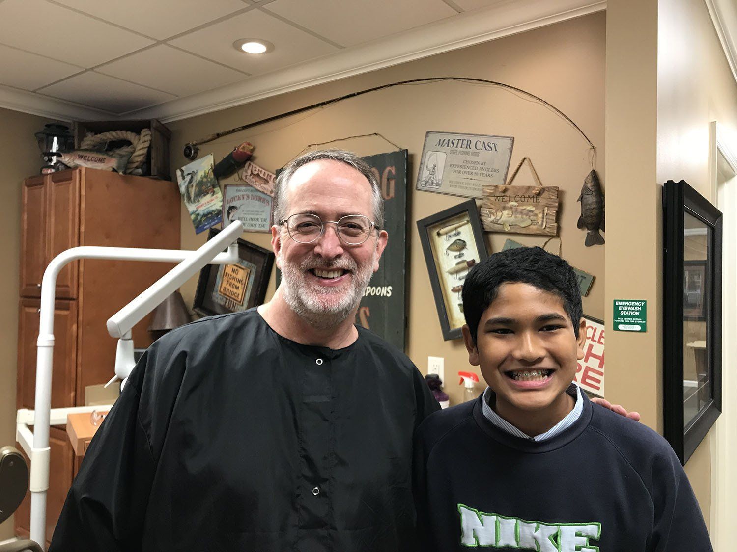 Dr. Coleman and patient after braces
