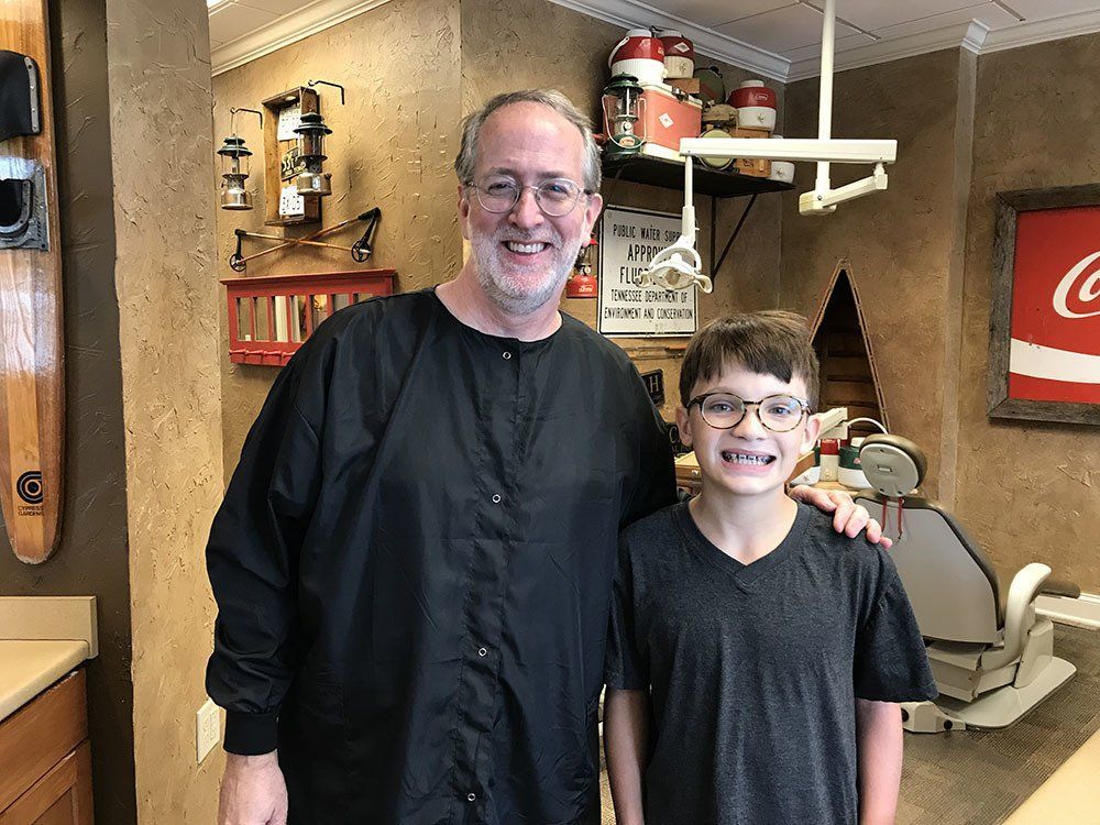 Dr. Coleman and patient before braces