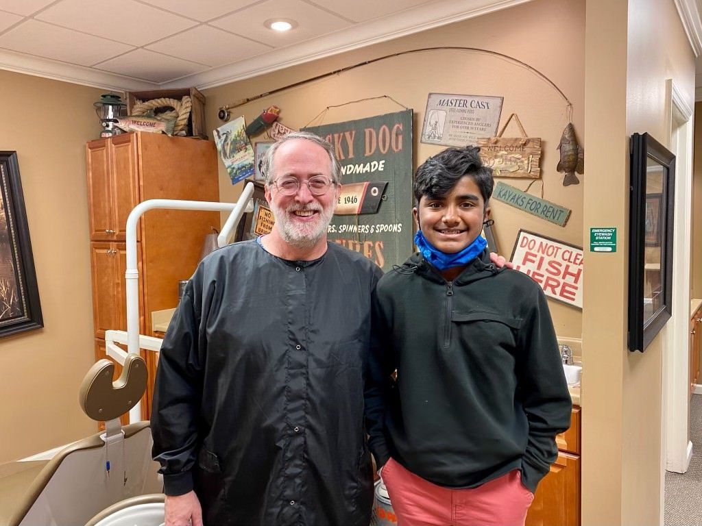 Dr. Coleman and patient before braces
