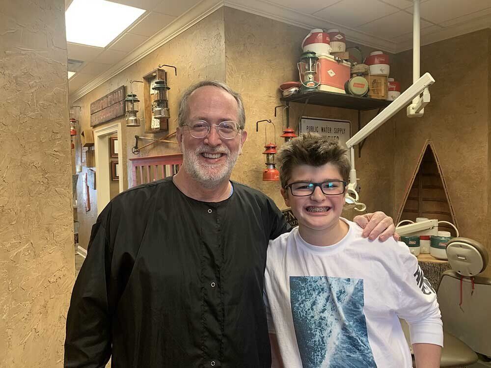 Dr. Coleman and patient before braces