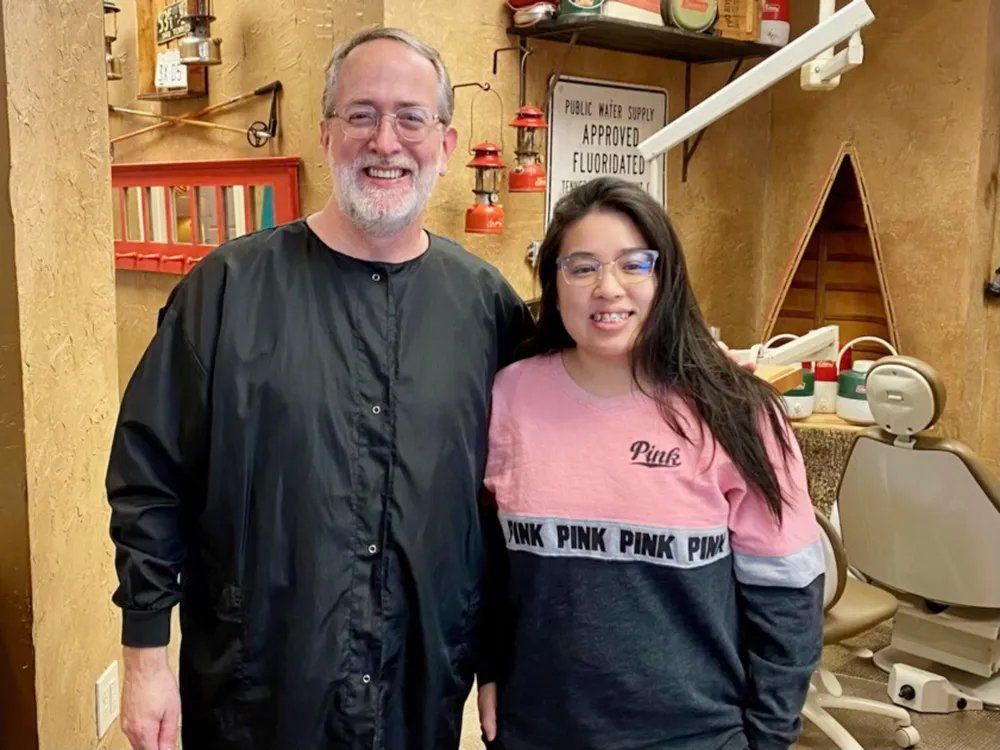 Dr. Coleman and patient before braces