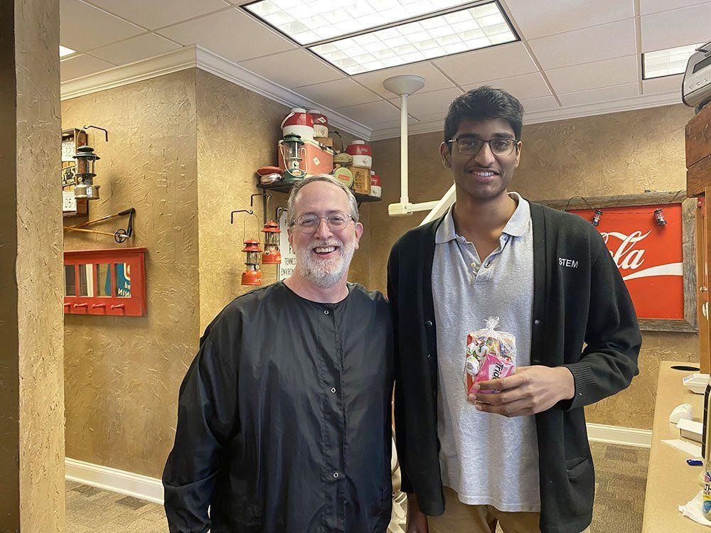 Dr. Coleman and patient before braces