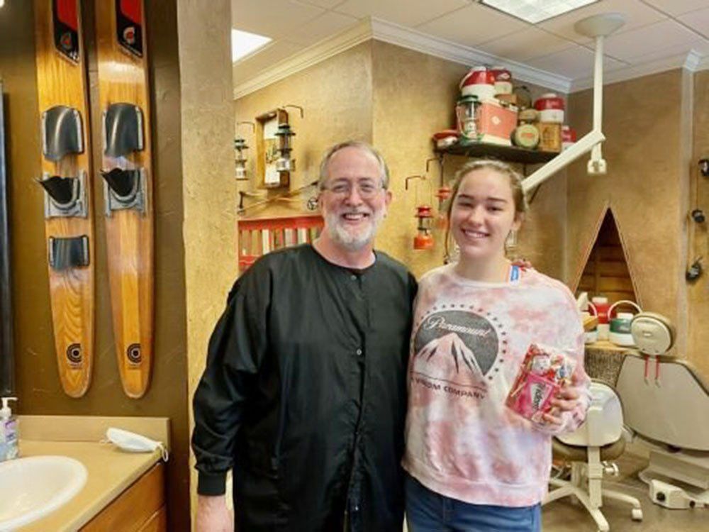 Dr. Coleman and patient before braces