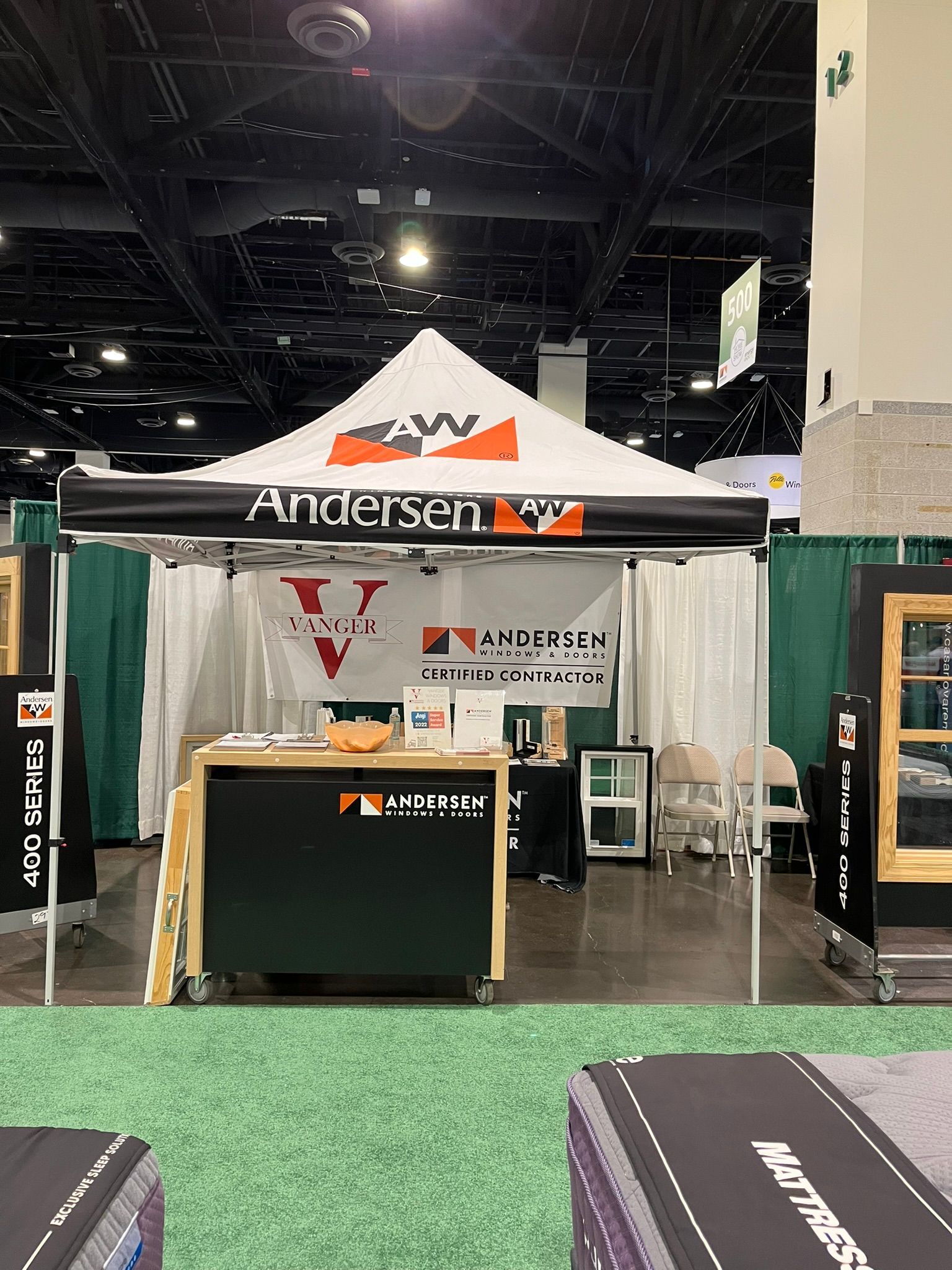 A tent with the word anderson on it is sitting in a room.