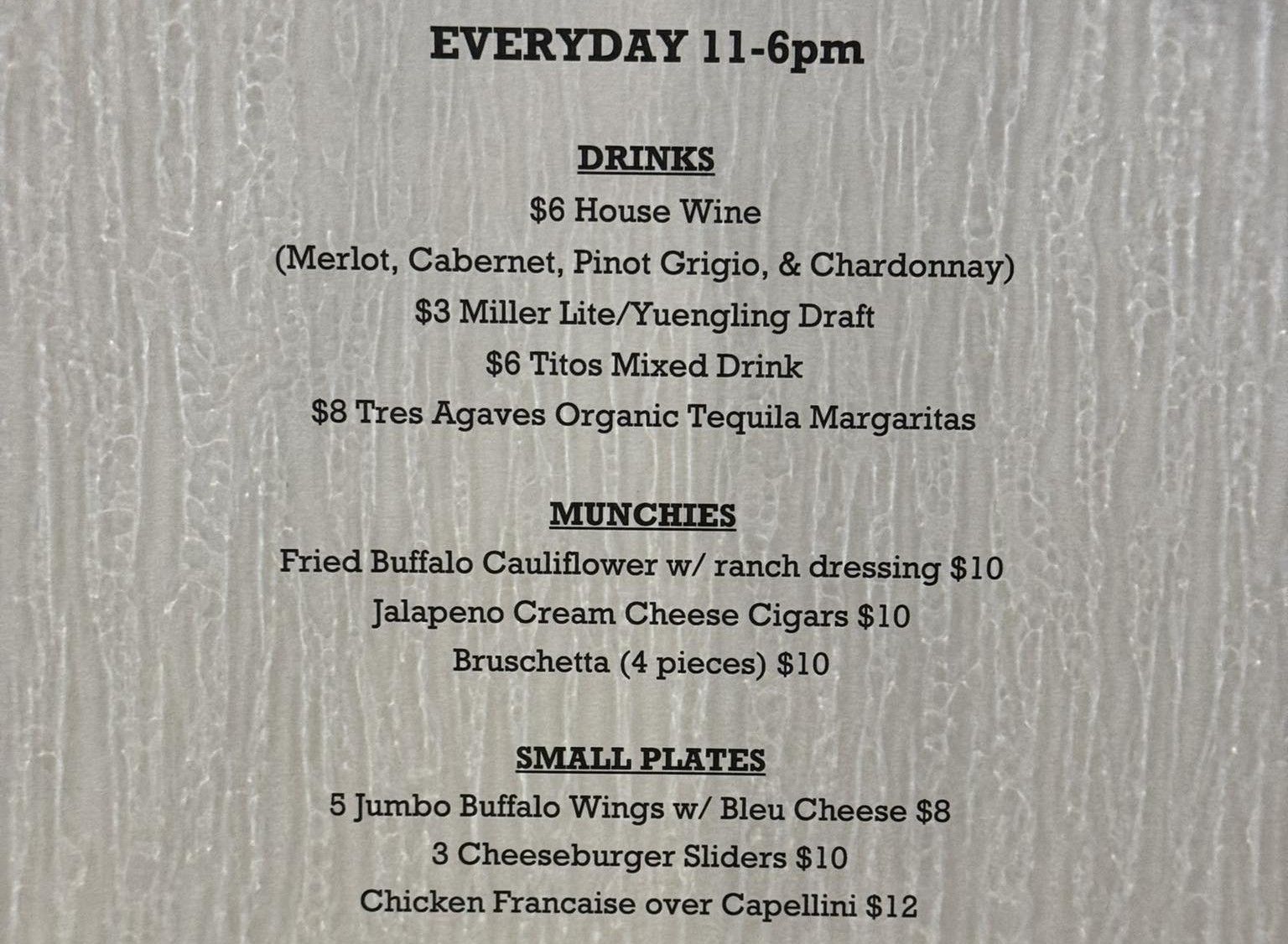 Menu for drinks, munchies, and small plates, available daily from 11 am to 6 pm.