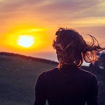 Woman watching the sunset