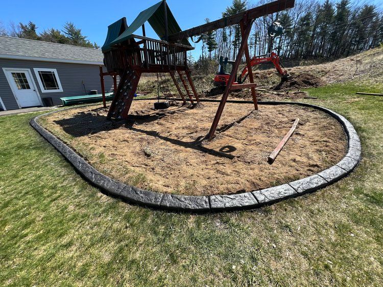 a playground is being built in the backyard of a house