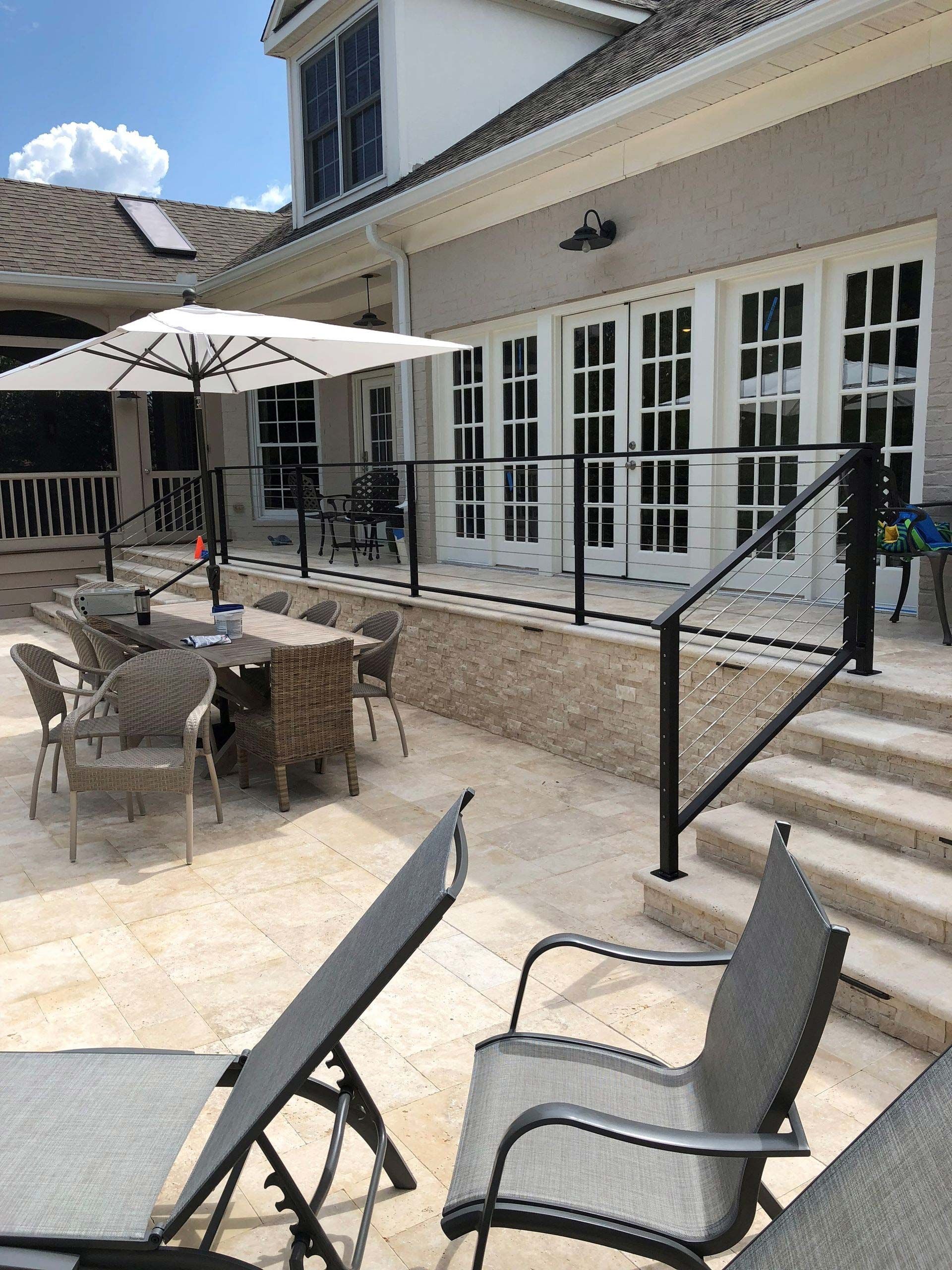 Deck with black handrails