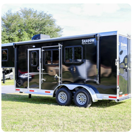 A black trailer with the word shadow on it