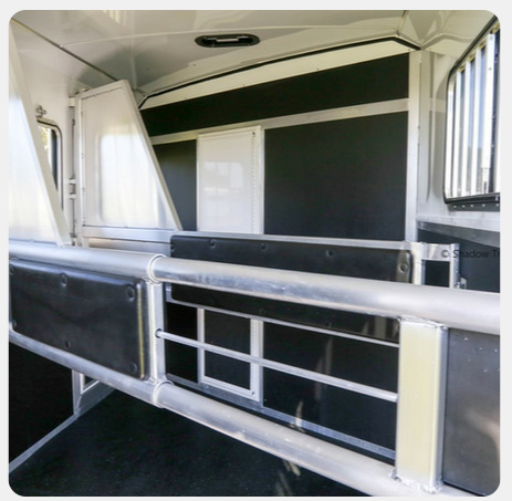 A picture of the inside of a horse trailer